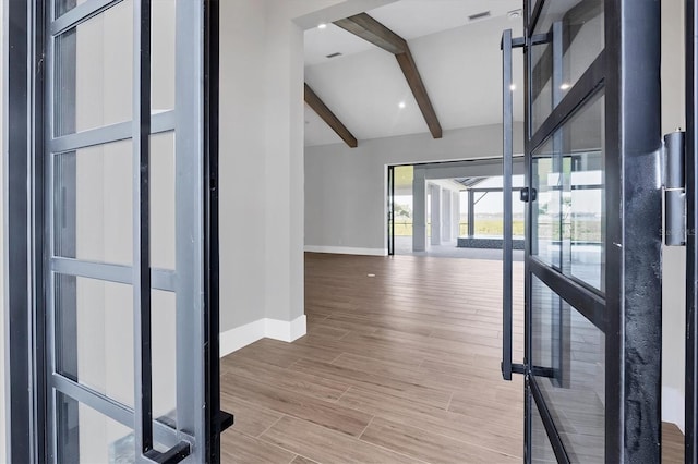 1613 4th St E, Palmetto, FL 34221 - hall featuring baseboards and wood finished floors