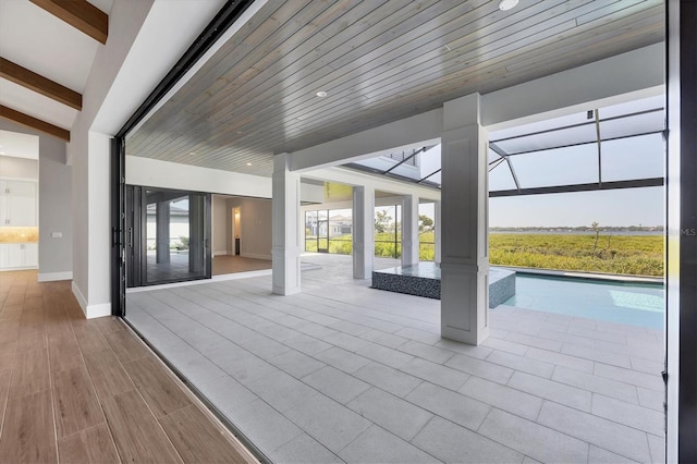 1613 4th St E, Palmetto, FL 34221 - view of patio / terrace featuring a swimming pool and glass enclosure