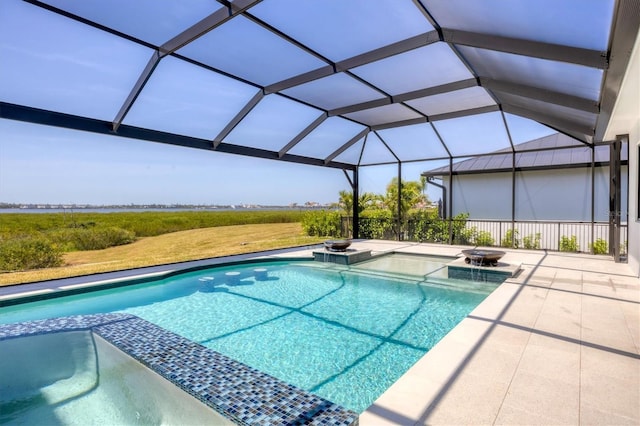1613 4th St E, Palmetto, FL 34221 - view of swimming pool featuring a pool with connected hot tub, a patio area, and glass enclosure
