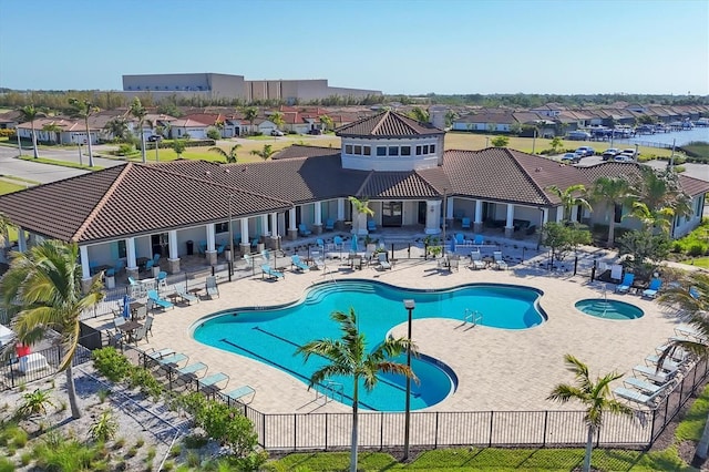 1613 4th St E, Palmetto, FL 34221 - community pool featuring fence, a residential view, and a patio