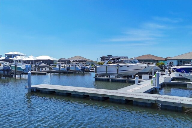 1613 4th St E, Palmetto, FL 34221 - dock area with a water view and a residential view