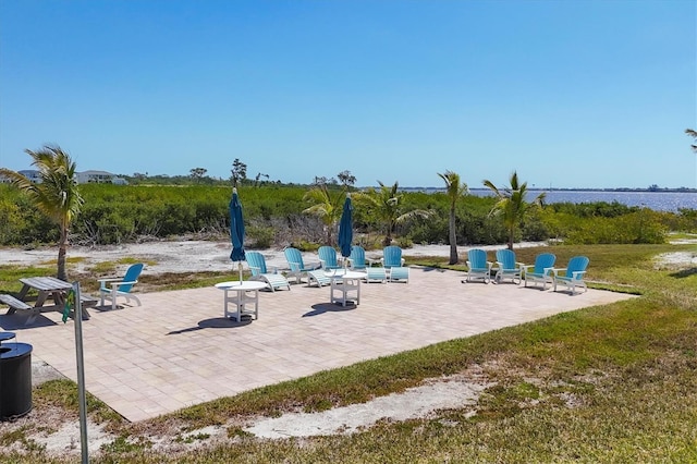 1613 4th St E, Palmetto, FL 34221 - view of patio with central AC
