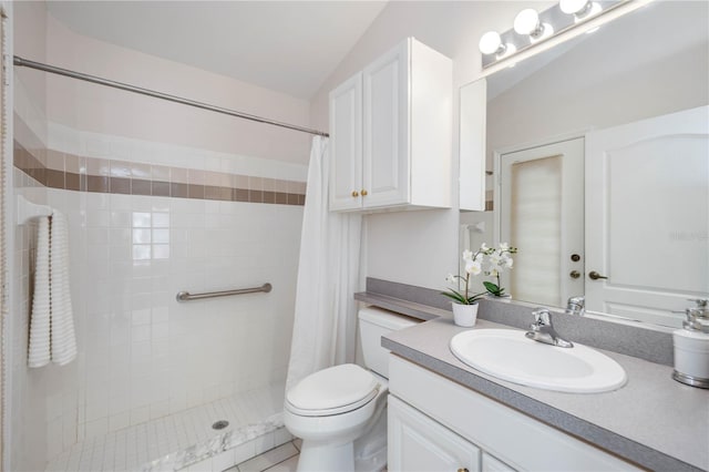 8824 Havenridge Dr, Sarasota, FL 34238 - bathroom featuring toilet, tiled shower, vanity, and vaulted ceiling