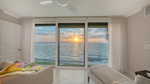 99 Sunset Dr Unit 102, Sarasota, FL 34236 - bedroom with a water view, light marble finish flooring, crown molding, access to exterior, and a ceiling fan