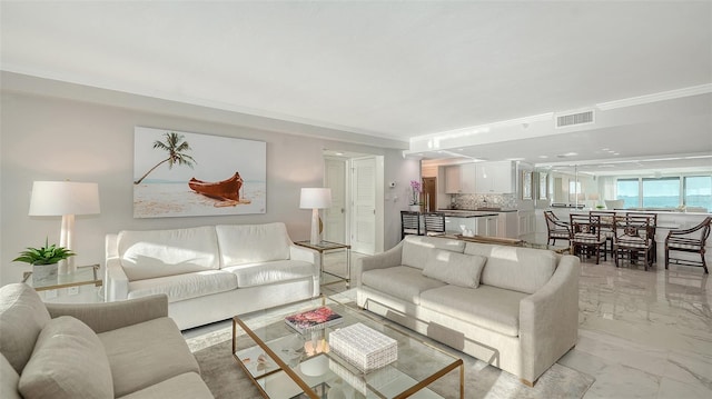 99 Sunset Dr Unit 102, Sarasota, FL 34236 - living room with light marble finish floors