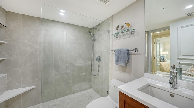 99 Sunset Dr Unit 102, Sarasota, FL 34236 - bathroom with toilet, walk in shower, vanity, and recessed lighting