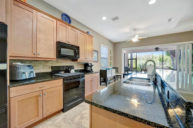 5009 Lake Overlook Ave, Bradenton, FL 34208 - kitchen featuring ceiling fan, tasteful backsplash, visible vents, black appliances, and a sink