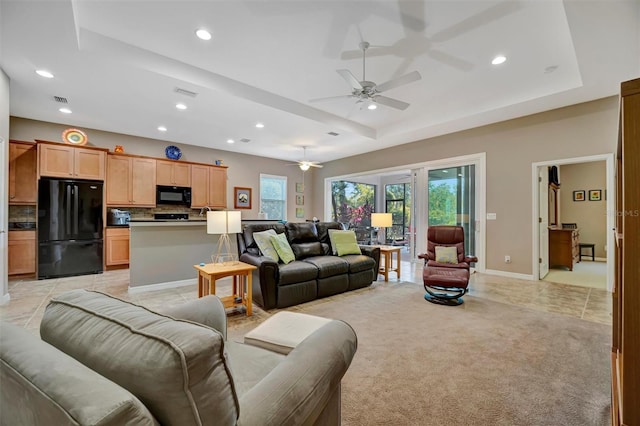 5009 Lake Overlook Ave, Bradenton, FL 34208 - living area with recessed lighting, light tile patterned floors, a raised ceiling, and ceiling fan