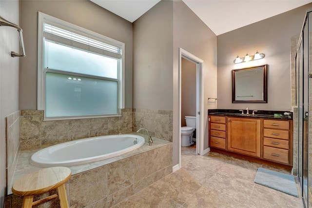 5009 Lake Overlook Ave, Bradenton, FL 34208 - full bath with vanity, a garden tub, and toilet