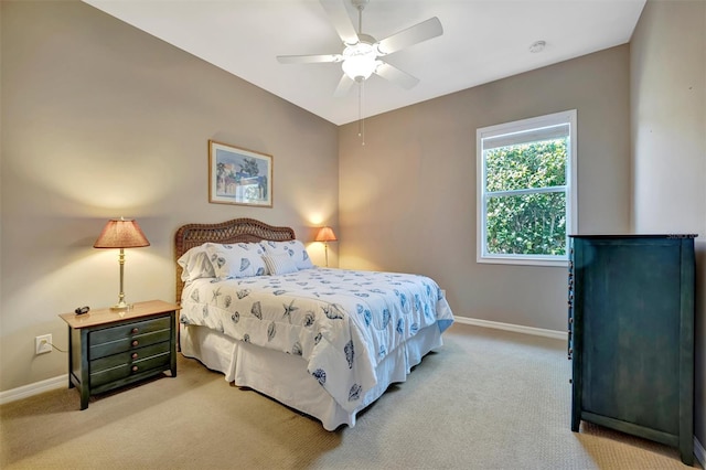 5009 Lake Overlook Ave, Bradenton, FL 34208 - bedroom featuring light carpet, baseboards, and ceiling fan