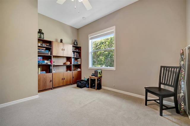 5009 Lake Overlook Ave, Bradenton, FL 34208 - living area featuring light carpet, ceiling fan, and baseboards