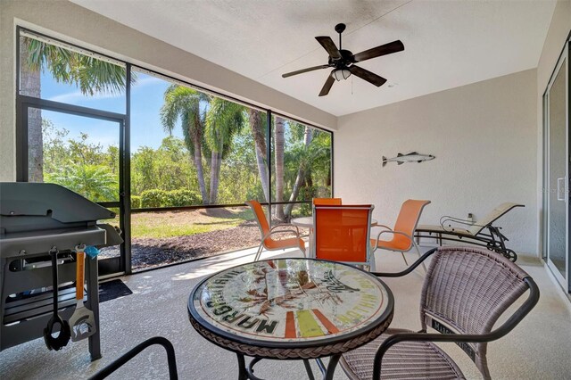 5009 Lake Overlook Ave, Bradenton, FL 34208 - sunroom / solarium featuring a wealth of natural light, a ceiling fan, and outdoor dining area