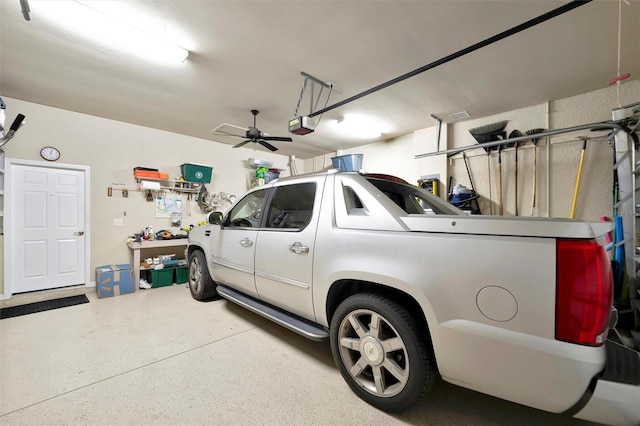 5009 Lake Overlook Ave, Bradenton, FL 34208 - garage featuring ceiling fan and a garage door opener