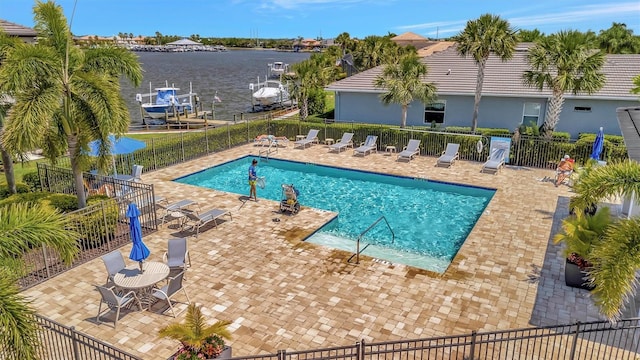 5009 Lake Overlook Ave, Bradenton, FL 34208 - pool with a water view, a patio, and fence