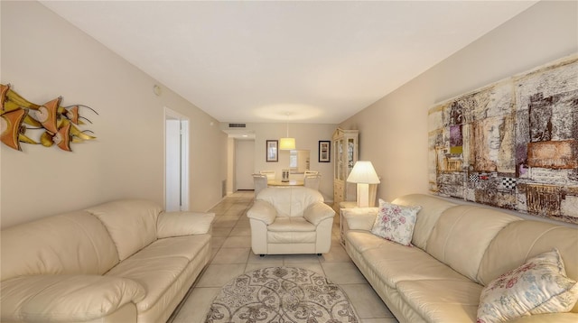 4350 Chatham Dr Unit E-105, Longboat Key, FL 34228 - living room featuring light tile patterned floors