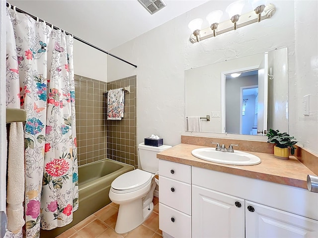 2705 21st Ave W, Bradenton, FL 34205 - full bath featuring tile patterned floors, shower / bathtub combination with curtain, visible vents, toilet, and vanity