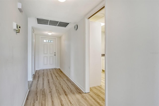 7173 W Country Club Dr N Unit 141, Sarasota, FL 34243 - hall featuring visible vents, light wood-type flooring, and baseboards