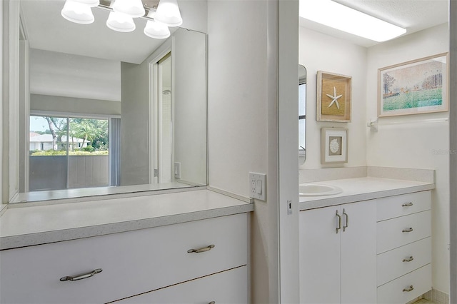 7173 W Country Club Dr N Unit 141, Sarasota, FL 34243 - bathroom with a chandelier and vanity