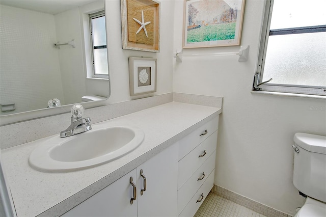 7173 W Country Club Dr N Unit 141, Sarasota, FL 34243 - half bath with tile patterned floors, toilet, and vanity