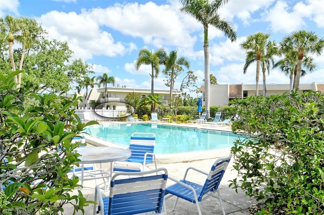 7173 W Country Club Dr N Unit 141, Sarasota, FL 34243 - community pool featuring a patio area and fence