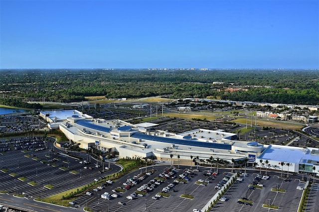 7173 W Country Club Dr N Unit 141, Sarasota, FL 34243 - birds eye view of property with a wooded view and a water view