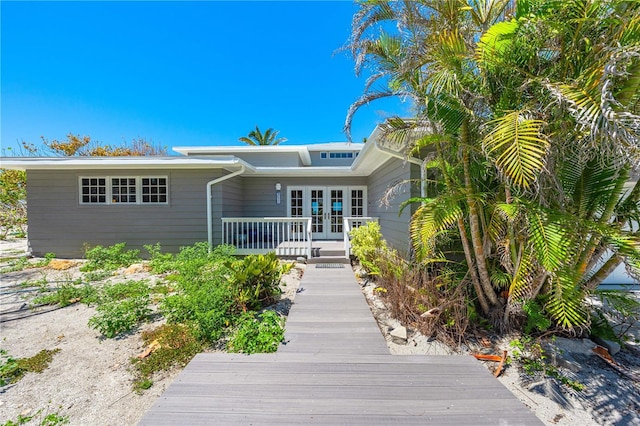 8592 Hidden Lagoon Rd, Sarasota, FL 34242 - view of front of house featuring french doors