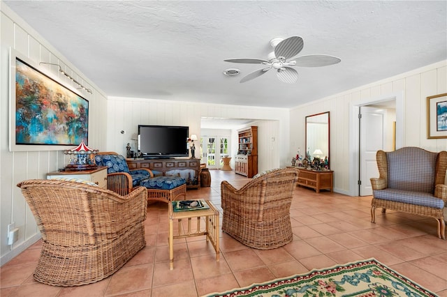 8592 Hidden Lagoon Rd, Sarasota, FL 34242 - tiled living room with ceiling fan