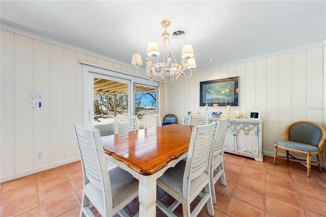 8592 Hidden Lagoon Rd, Sarasota, FL 34242 - dining room with a chandelier and light tile patterned flooring