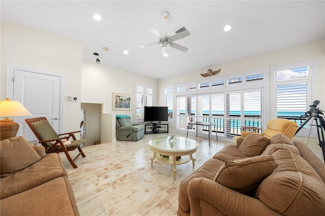 8592 Hidden Lagoon Rd, Sarasota, FL 34242 - living area with ceiling fan, recessed lighting, and light wood-style flooring