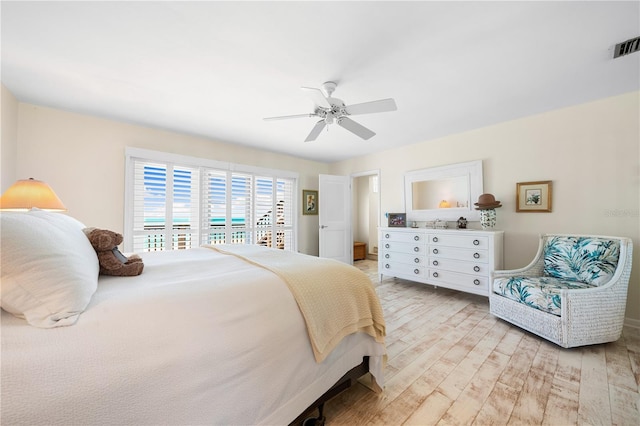 8592 Hidden Lagoon Rd, Sarasota, FL 34242 - bedroom featuring light wood-type flooring and a ceiling fan
