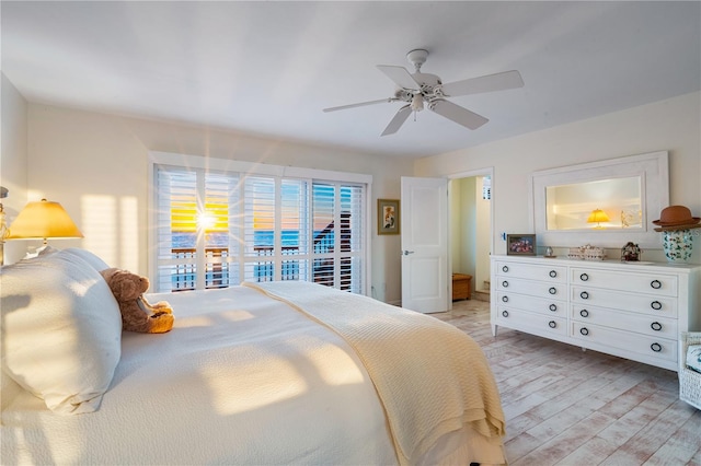 8592 Hidden Lagoon Rd, Sarasota, FL 34242 - bedroom with light wood finished floors, ceiling fan, and access to outside