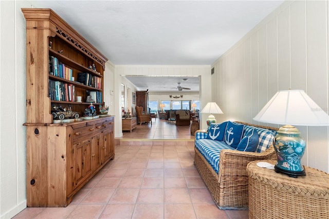 8592 Hidden Lagoon Rd, Sarasota, FL 34242 - living area with light tile patterned floors and a ceiling fan
