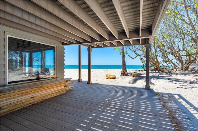 8592 Hidden Lagoon Rd, Sarasota, FL 34242 - wooden deck with view of water and beach