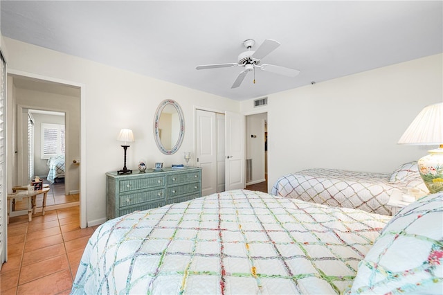 8592 Hidden Lagoon Rd, Sarasota, FL 34242 - bedroom featuring light tile patterned floors, a closet, and a ceiling fan