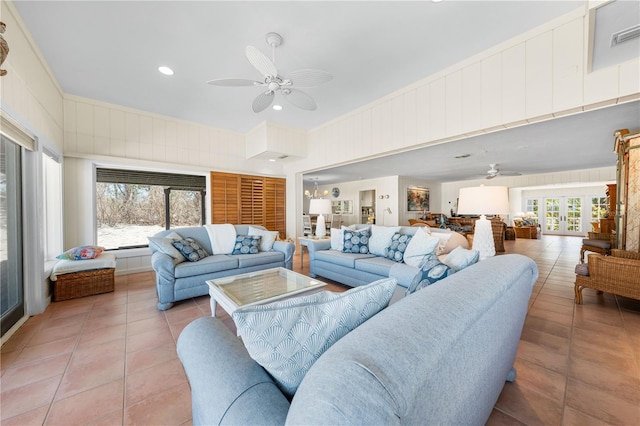 8592 Hidden Lagoon Rd, Sarasota, FL 34242 - living room featuring a ceiling fan, light tile patterned flooring, and recessed lighting