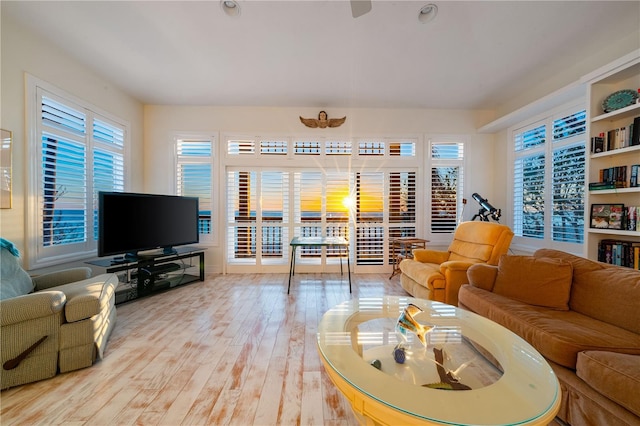8592 Hidden Lagoon Rd, Sarasota, FL 34242 - living room featuring healthy amount of natural light and wood-type flooring