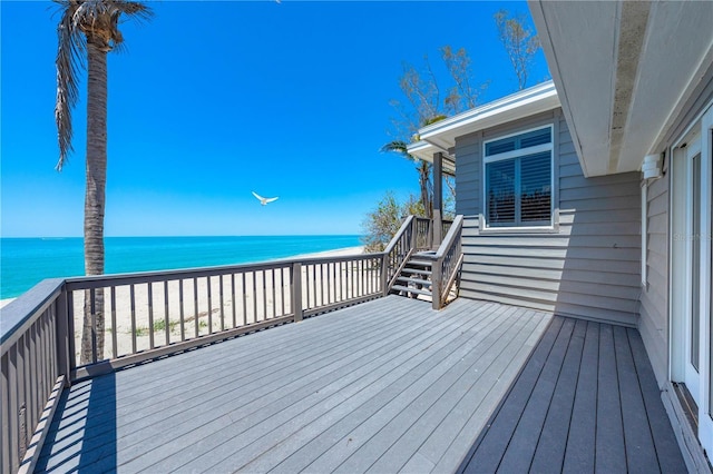 8592 Hidden Lagoon Rd, Sarasota, FL 34242 - wooden deck featuring view of water and beach