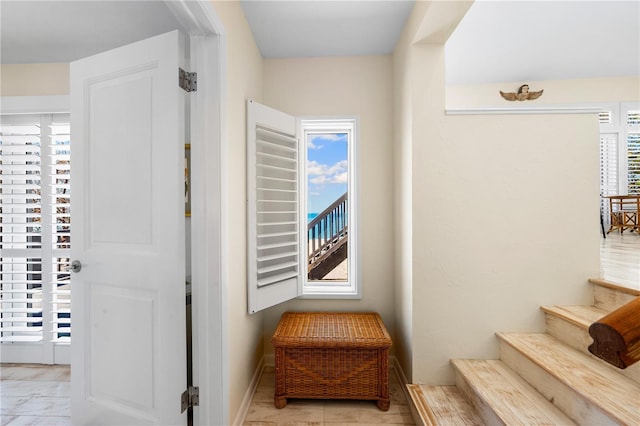 8592 Hidden Lagoon Rd, Sarasota, FL 34242 - stairs featuring baseboards