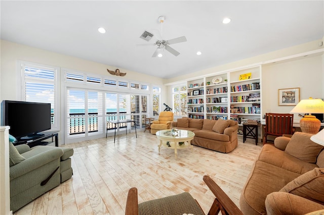 8592 Hidden Lagoon Rd, Sarasota, FL 34242 - living room with ceiling fan, recessed lighting, and wood finished floors