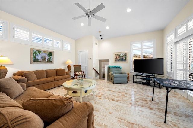 8592 Hidden Lagoon Rd, Sarasota, FL 34242 - living room featuring wood finished floors, healthy amount of natural light, ceiling fan, recessed lighting, and high vaulted ceiling