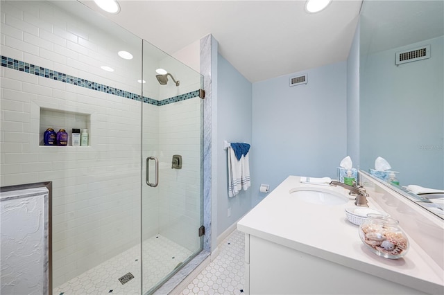 8592 Hidden Lagoon Rd, Sarasota, FL 34242 - full bath with vanity, a shower stall, and recessed lighting