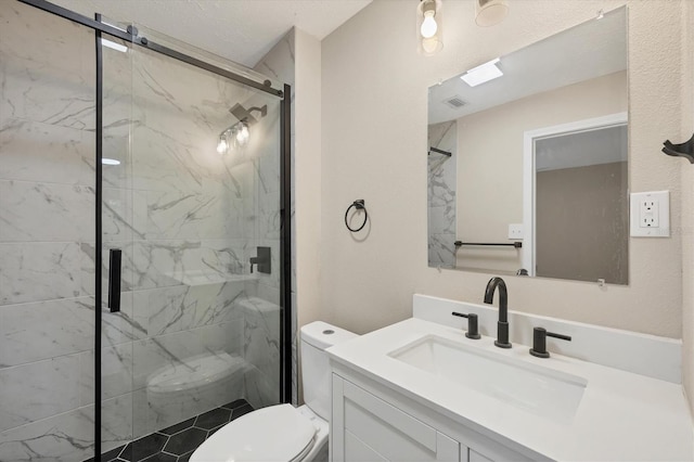 full bath with vanity, a marble finish shower, visible vents, and toilet