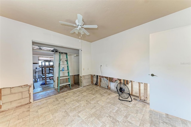 unfurnished room featuring ceiling fan