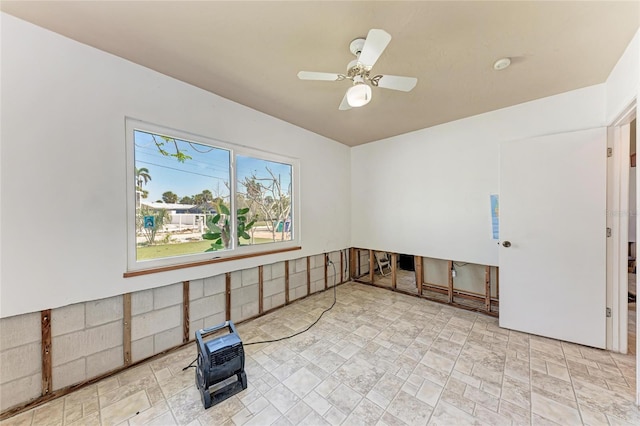 unfurnished room featuring ceiling fan