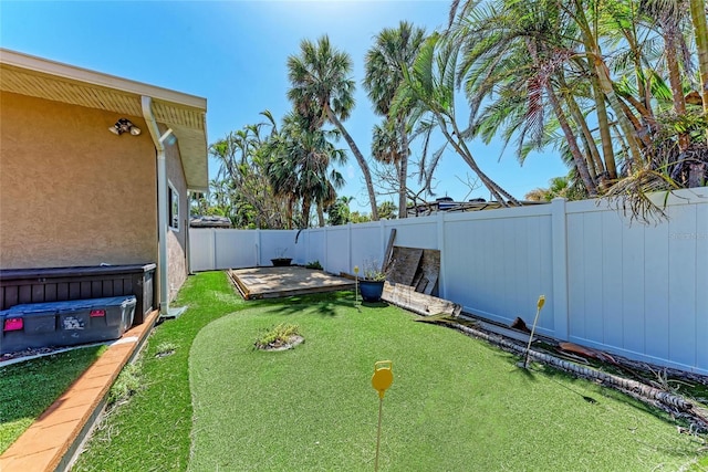 view of yard with a fenced backyard