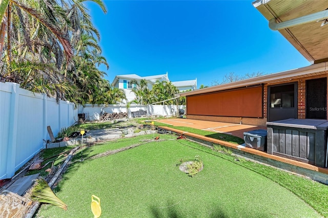 view of yard with a fenced backyard