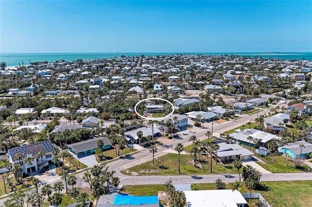 bird's eye view with a water view and a residential view