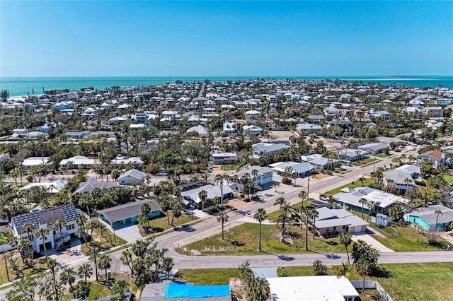 birds eye view of property featuring a residential view and a water view