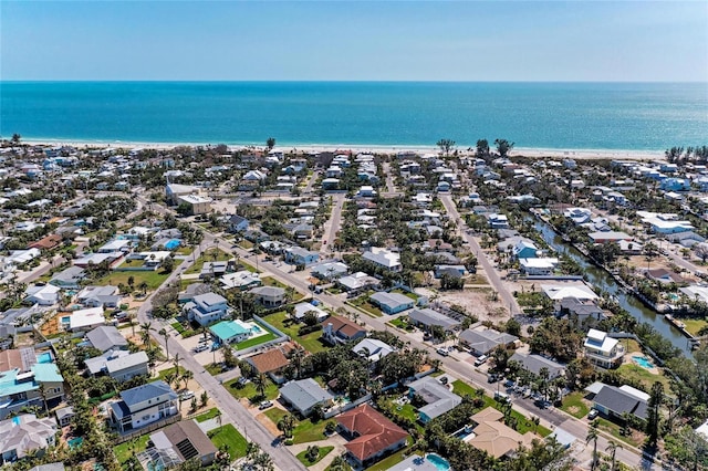 bird's eye view with a beach view, a residential view, and a water view