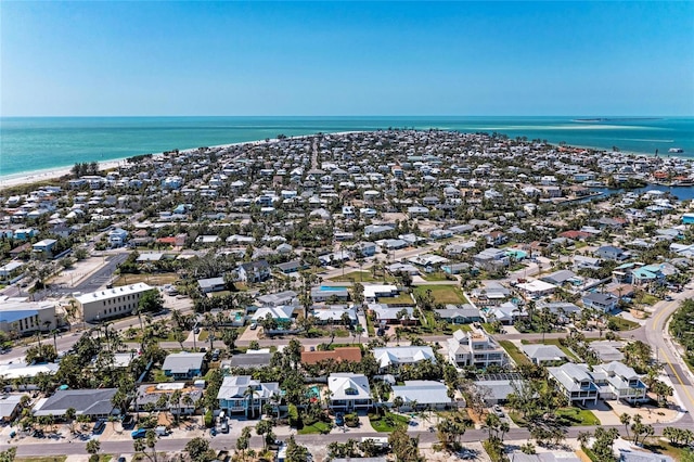 drone / aerial view featuring a water view and a residential view